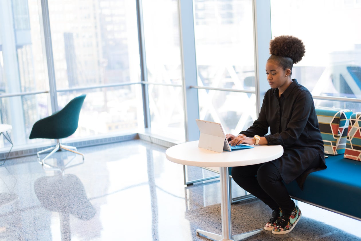 A leader working by a window